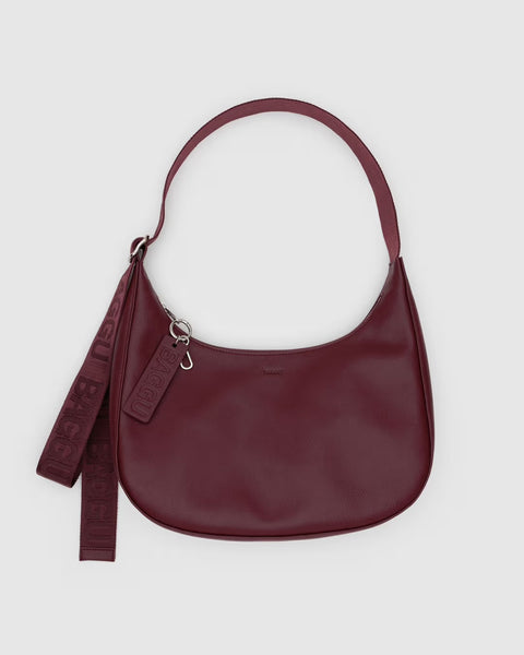 MEDIUM RECYCLED LEATHER CRESCENT BAG, Mahogany — by Baggu
