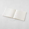 MD CAHIER DE NOTE COTTON A5 CARRÉ (PAGES VIERGES) — par Midori