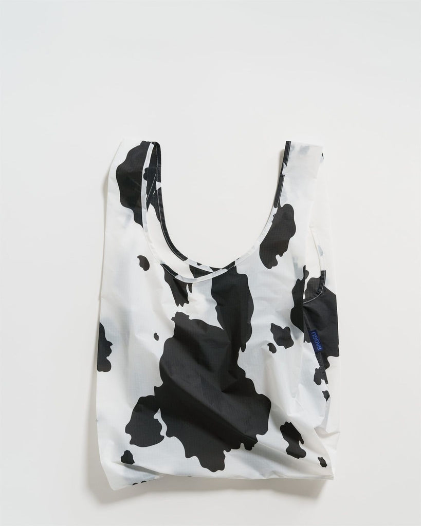 STANDARD BLACK AND WHITE COW REUSABLE BAG — by Baggu
